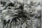 Прикроватный коврик из тибетской овчины черно-белый 0,55 х 1,15 м