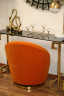 Кресло оранжевое вращающееся