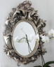 Зеркало овальное в серебристом крупном багете