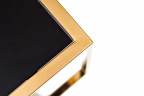 Столик журнальный из чёрного стекла в раме из золотого металла, 50 см