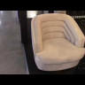 Кресло вращающееся с кремовым велюром